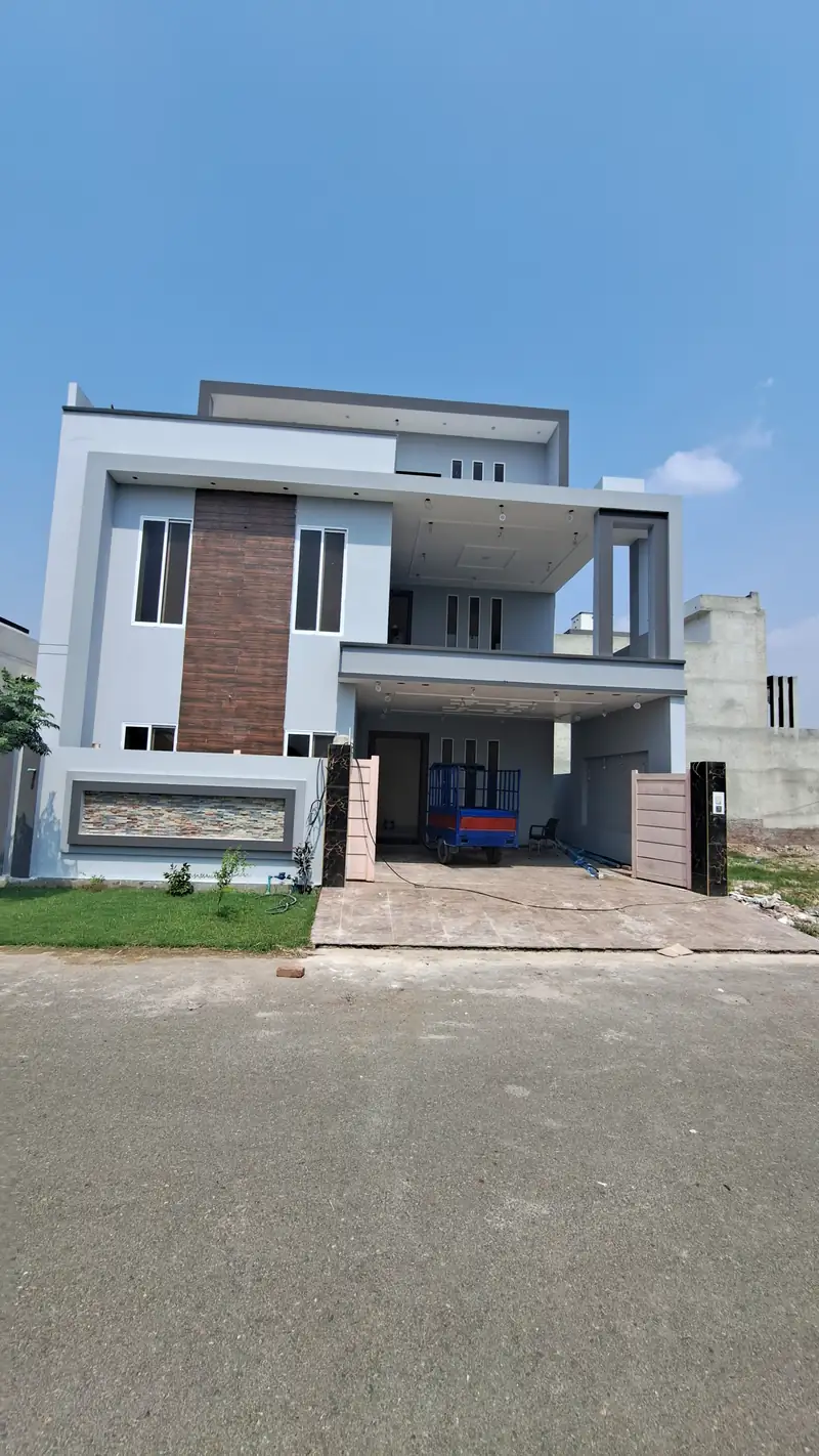 House 113 Dream Garden Multan front elevation full view with boundary wall and main gate 2022-23
